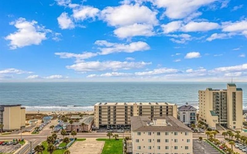 aerial view of building and ocean 